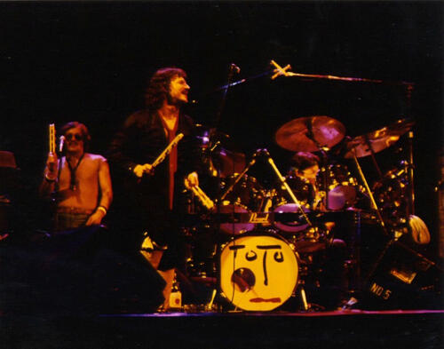 Toto The band Toto playing live music; their percussionist plays a jestick